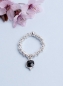 Preview: Elastischer Ring mit facettierten Sterling Silber Elementen und Onyx Anhänger