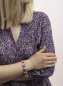 Preview: Statement Armband mit Sterling Silber Kugeln in 8 mm, pastell Lila Satinband und feinem Makramee in dunkel Lila.